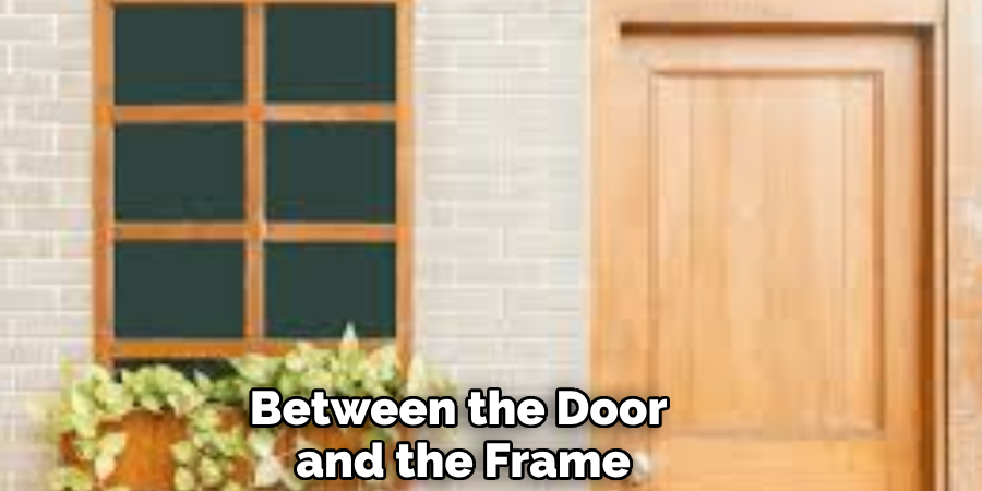 Between the Door 
and the Frame