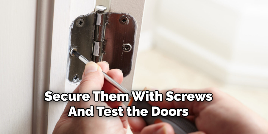 Secure Them With Screws
And Test the Doors
